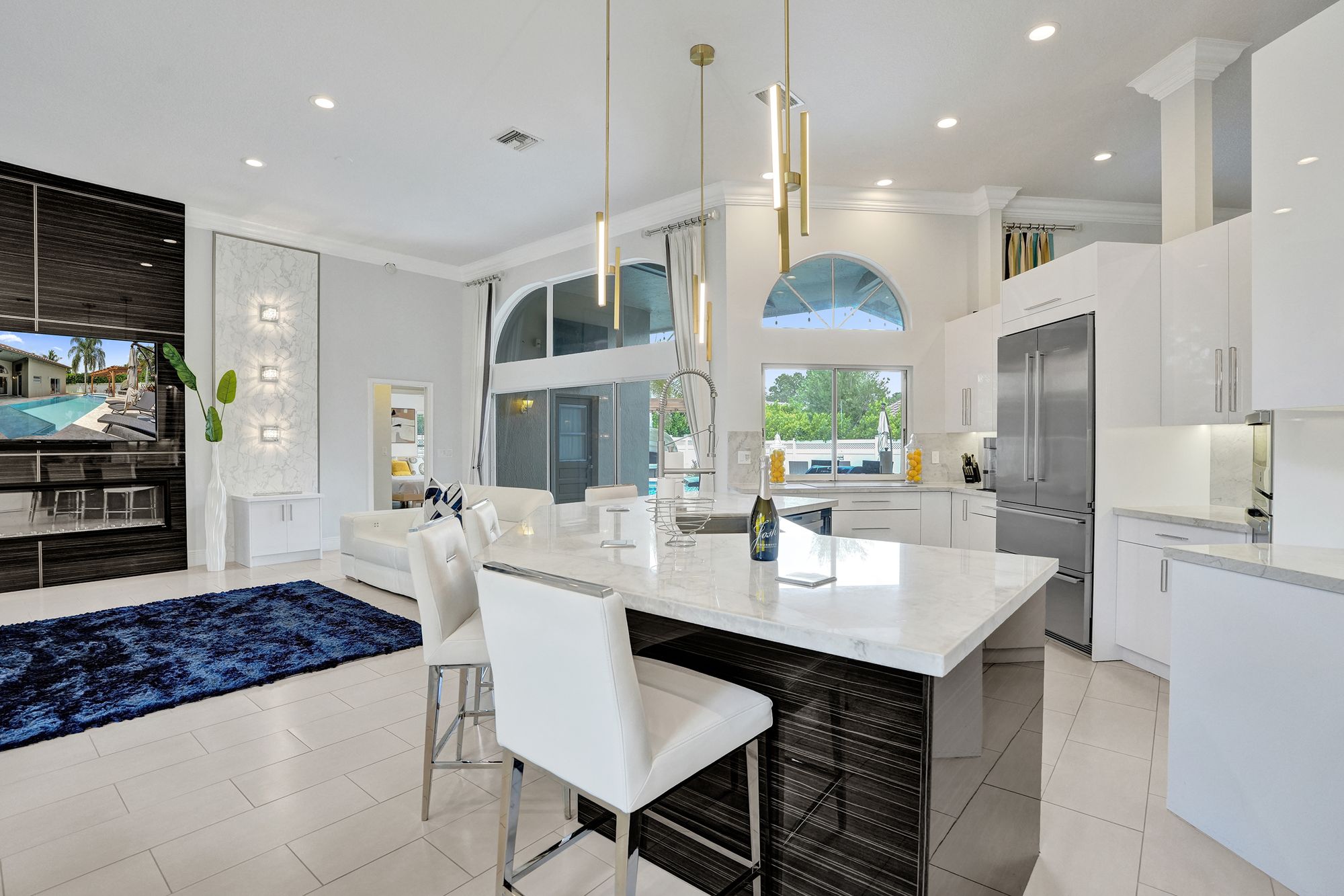 Kitchen reset and ready for arrival in a South Florida pool home